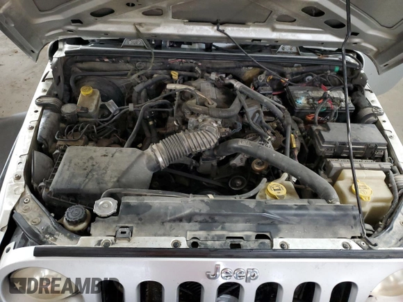 2008 Jeep Wrangler X с VIN 1J4FZ24138L526514, выставлен на аукционе Copart как лот 72569194 с пробегом 216 928 миль миль и Списание • Salvage title. История ставок и продаж доступна на DreamBid. Изображение 11.