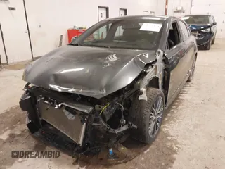 2023 Kia Forte GT-Line with VIN 3KPF54AD0PE614424, listed as a IAAI auction lot 41724124 with 34,398 mi miles. Bid and sale history available at carsss.com. Image 6.