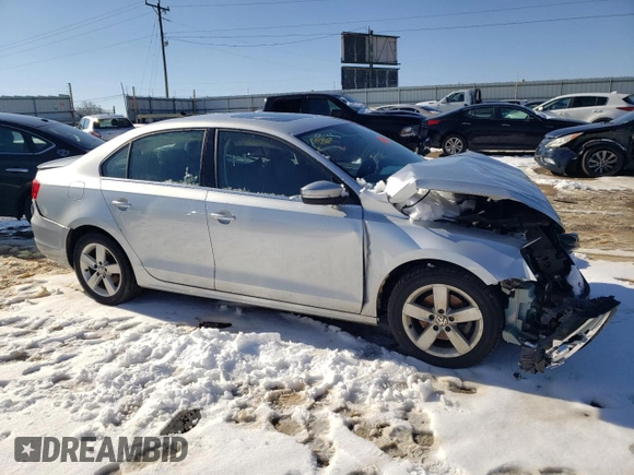 2012 Volkswagen Jetta TDI w/Premium with VIN 3VWLL7AJXCM038466, listed as a Copart auction lot 87885425 with 264,882 mi miles and Salvage title. Bid and sale history available at DreamBid. Image 4.