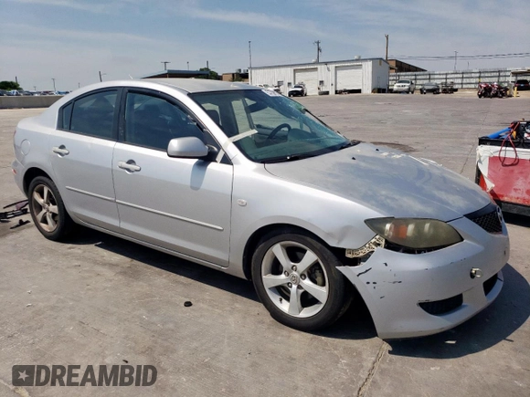 2005 Mazda 3 i with VIN JM1BK32F351347622, listed as a Copart auction lot 53729205 with 205,194 mi miles and Salvage Title. Bid and sale history available at DreamBid. Image 4.