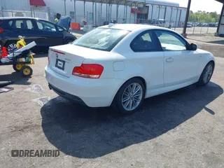2013 BMW 1 Series 128i with VIN WBAUP7C50DVP24385, listed as a IAAI auction lot 41913737 with 46,217 mi miles and . Bid and sale history available at carsss.com. Image 4.