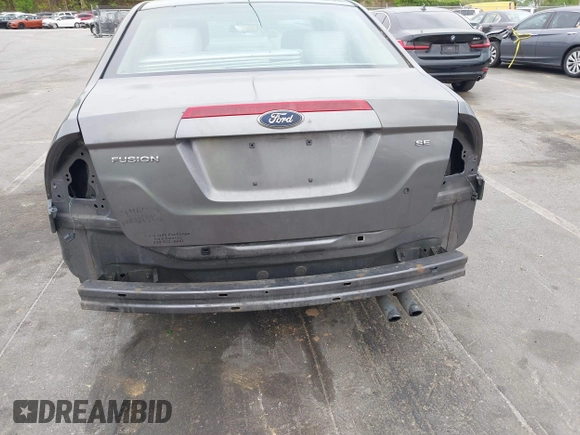 2011 Ford Fusion SE with VIN 3FAHP0HA1BR203046, listed as a IAAI auction lot 42011121 with 302,078 mi miles. Bid and sale history available at carsss.com. Image 6.