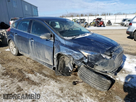 2018 Ford Focus Titanium z VIN 1FADP3N2XJL297048, wystawiony jako Copart lot #61579925 z przebiegiem 68 774 mil mil oraz Szkoda całkowita • Salvage title. Historia ofert i sprzedaży dostępna na DreamBid. Obrazek 4.