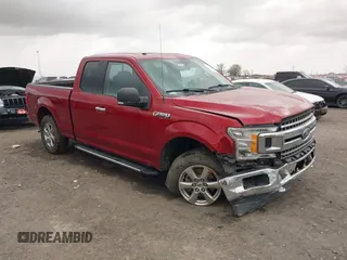 2018 Ford F-150 XL with VIN 1FTFX1E51JKF98962, listed as a IAAI auction lot 41827587 with 128,031 mi miles and . Bid and sale history available at DreamBid. Image 1.