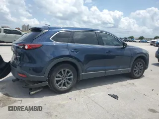 2020 Mazda CX-9 Touring with VIN JM3TCACY1L0423340, listed as a Copart auction lot 57389305 with 64,737 mi miles and Salvage title. Bid and sale history available at DreamBid. Image 3.