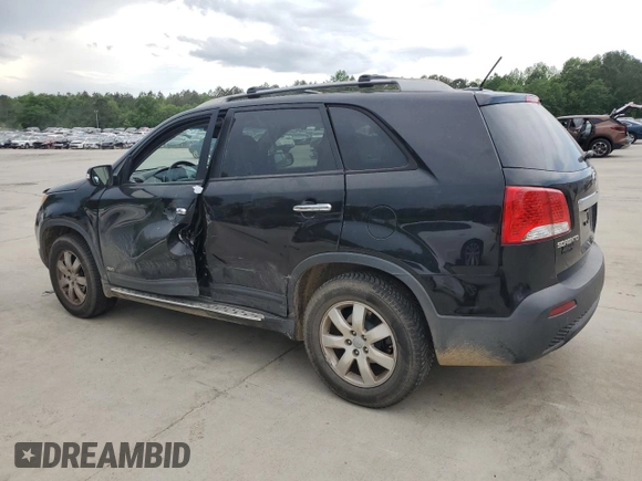 2012 Kia Sorento LX z VIN 5XYKTCA67CG279174, wystawiony jako Copart lot #54363095 z przebiegiem 181 112 mil mil oraz Szkoda całkowita • Salvage title. Historia ofert i sprzedaży dostępna na DreamBid. Obrazek 2.