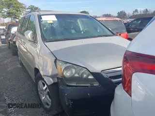 2006 Honda Odyssey EX with VIN 5FNRL38426B424992, listed as a IAAI auction lot 40945375 with 223,686 mi miles and . Bid and sale history available at DreamBid. Image 1.