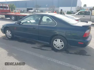 1997 Honda Accord EX w/Leather with VIN 1HGCD7158VA014025, listed as a IAAI auction lot 41582343 with 302,660 mi miles. Bid and sale history available at carsss.com. Image 3.