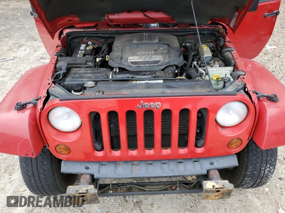 2012 Jeep Wrangler Arctic z VIN 1C4AJWBG9CL123832, wystawiony jako Copart lot #87376204 z przebiegiem 174 097 mil mil oraz Szkoda całkowita • Salvage title. Historia ofert i sprzedaży dostępna na DreamBid. Obrazek 12.