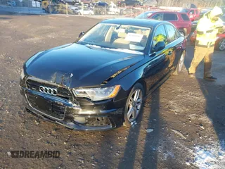 2012 Audi A6 Prestige z VIN WAUHGAFC0CN076036, wystawiony jako IAAI lot #41409687 z przebiegiem 54 601 mil mil oraz . Historia ofert i sprzedaży dostępna na DreamBid. Obrazek 2.