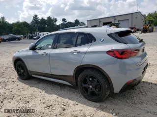 2021 BMW X2 xDrive28i with VIN WBXYJ1C04M5S67817, listed as a Copart auction lot 68214304 with 54,454 mi miles and Salvage Title. Bid and sale history available at carsss.com. Image 2.
