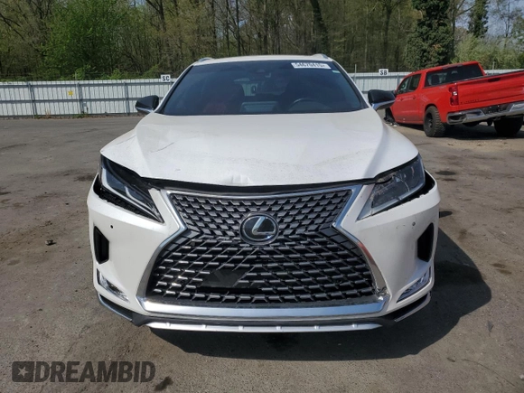 2022 Lexus RX with VIN 2T2SZMDA2NC309843, listed as a Copart auction lot 54670415 with 54,298 mi miles and Salvage Title. Bid and sale history available at carsss.com. Image 5.