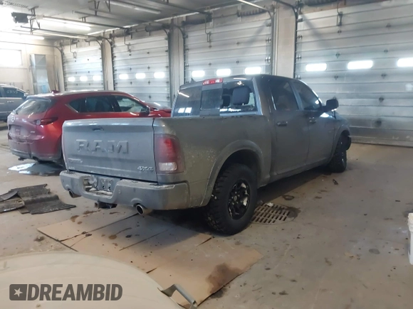 2018 Ram 1500 Rebel with VIN 1C6RR7YT1JS234777, listed as a IAAI auction lot 41409525 with 119,497 mi miles. Bid and sale history available at carsss.com. Image 4.