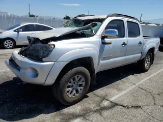2005 Toyota Tacoma PreRunner with VIN 3TMJU62N05M004140, listed as a Copart auction lot 64140635 with 317,682 mi miles and Salvage title. Bid and sale history available at DreamBid. Image 1.