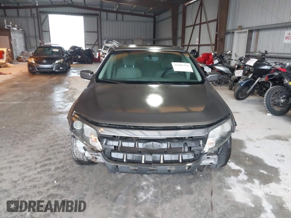 2012 Ford Fusion SE z VIN 3FAHP0HA9CR325249, wystawiony jako IAAI lot #41803339 z przebiegiem 203 650 mil mil oraz . Historia ofert i sprzedaży dostępna na DreamBid. Obrazek 12.