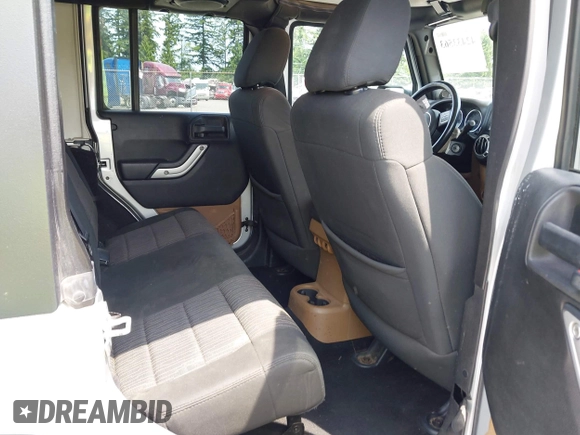 2012 Jeep Wrangler Unlimited Altitude with VIN 1C4HJWEG2CL140059, listed as a IAAI auction lot 42433563 with 189,868 mi miles and . Bid and sale history available at DreamBid. Image 8.