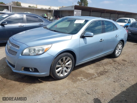 2013 Chevrolet Malibu LTZ with VIN 1G11H5SA7DU134124, listed as a IAAI auction lot 42052592 with 124,031 mi miles. Bid and sale history available at carsss.com. Image 2.
