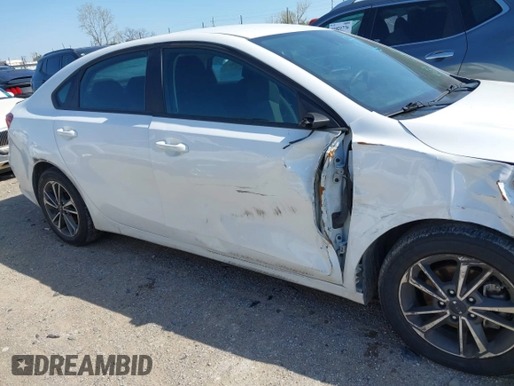 2022 Kia Forte LXS z VIN 3KPF24AD1NE479654, wystawiony jako IAAI lot #41950997 z przebiegiem 71 168 mil mil oraz . Historia ofert i sprzedaży dostępna na DreamBid. Obrazek 13.