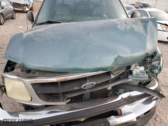 1998 Ford F-150 Standard with VIN 1FTZF1768WKA27336, listed as a Copart auction lot 85762394 with 203,447 mi miles and Salvage Title. Bid and sale history available at carsss.com. Image 11.