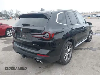 2022 BMW X3 sDrive30i with VIN WBX47DP03NN163698, listed as a IAAI auction lot 41803883 with 28,259 mi miles and . Bid and sale history available at DreamBid. Image 4.