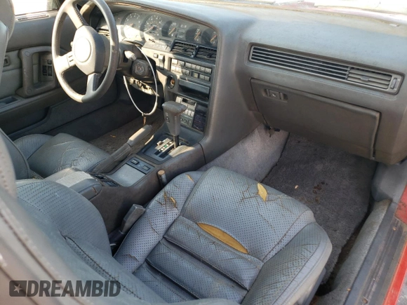 1988 Toyota Supra z VIN JT2MA71JXJ0094266, wystawiony jako Copart lot #59028715 z przebiegiem 133 654 mil mil oraz Czysty tytuł • Clean title. Historia ofert i sprzedaży dostępna na DreamBid. Obrazek 8.