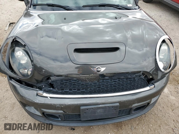 2015 MINI Convertible S z VIN WMWZP3C53F2A91032, wystawiony jako Copart lot #87769995 z przebiegiem 94 165 mil mil oraz Szkoda całkowita • Salvage title. Historia ofert i sprzedaży dostępna na DreamBid. Obrazek 13.