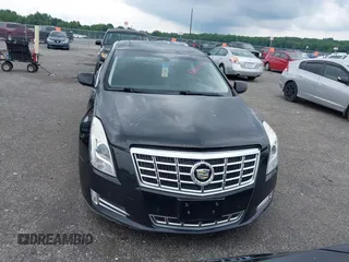 2013 Cadillac XTS Luxury z VIN 2G61P5S34D9183065, wystawiony jako IAAI lot #42665741 z przebiegiem 209 585 mil mil oraz . Historia ofert i sprzedaży dostępna na DreamBid. Obrazek 13.