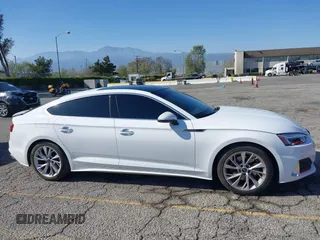 2023 Audi A5 Sportback Premium z VIN WAUABCF56PA039597, wystawiony jako IAAI lot #41979540 z przebiegiem 32 654 mil mil oraz . Historia ofert i sprzedaży dostępna na DreamBid. Obrazek 13.
