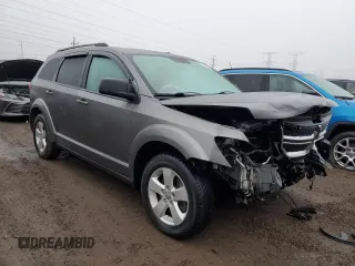 2013 Dodge Journey American Value with VIN 3C4PDCABXDT578099, listed as a Copart auction lot 48867795 with 187,338 mi miles and Salvage title. Bid and sale history available at DreamBid. Image 4.