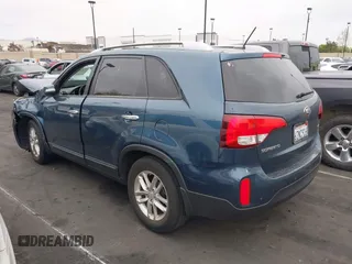 2014 Kia Sorento LX with VIN 5XYKT3A66EG440701, listed as a IAAI auction lot 42067372 with 40,559 mi miles and . Bid and sale history available at DreamBid. Image 3.
