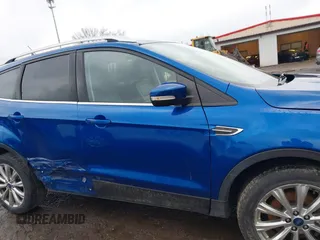 2017 Ford Escape Titanium with VIN 1FMCU9JD8HUA59000, listed as a IAAI auction lot 41559788 with 90,319 mi miles. Bid and sale history available at carsss.com. Image 13.