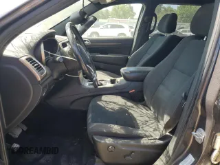 2016 Jeep Grand Cherokee Laredo with VIN 1C4RJFAG2GC328841, listed as a Copart auction lot 63553435 with 100,472 mi miles and Salvage title. Bid and sale history available at DreamBid. Image 7.