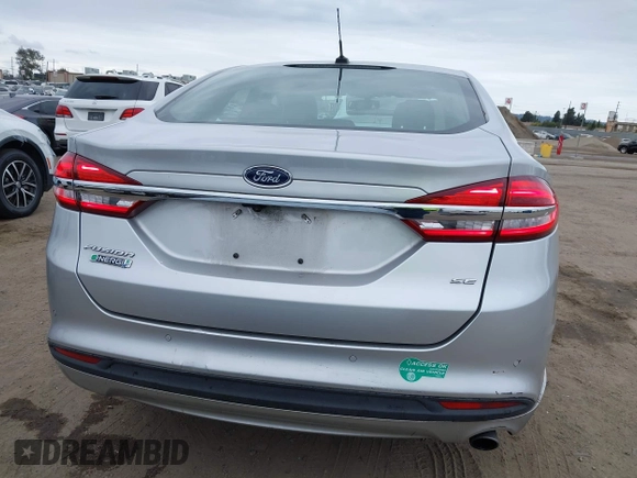 2017 Ford Fusion Energi SE with VIN 3FA6P0PU9HR354096, listed as a IAAI auction lot 42064703 with 69,601 mi miles. Bid and sale history available at carsss.com. Image 16.