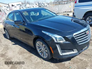 2019 Cadillac CTS Luxury AWD with VIN 1G6AX5SX4K0117318, listed as a IAAI auction lot 41995784 with 69,821 mi miles and . Bid and sale history available at DreamBid. Image 1.
