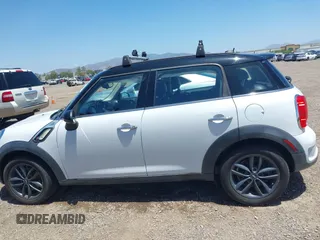 2014 MINI Countryman S z VIN WMWZC3C56EWP52407, wystawiony jako IAAI lot #42255716 z przebiegiem 74 943 mil mil oraz . Historia ofert i sprzedaży dostępna na DreamBid. Obrazek 14.