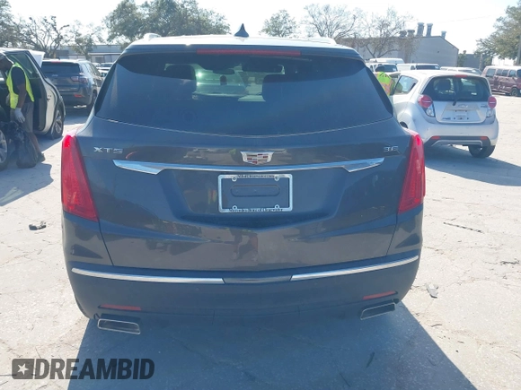 2019 Cadillac XT5 FWD with VIN 1GYKNARS5KZ143510, listed as a IAAI auction lot 41553279 with 53,943 mi miles and . Bid and sale history available at carsss.com. Image 16.