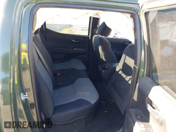2021 Toyota Tacoma SR with VIN 3TYCZ5AN2MT039450, listed as a IAAI auction lot 40457613 with 54,176 mi miles and . Bid and sale history available at DreamBid. Image 8.