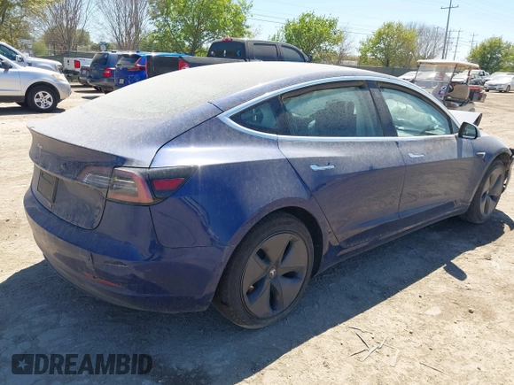 2020 Tesla Model 3 Standard Range Plus z VIN 5YJ3E1EA2LF739866, wystawiony jako IAAI lot #41842179 z przebiegiem 70 089 mil mil oraz . Historia ofert i sprzedaży dostępna na DreamBid. Obrazek 4.