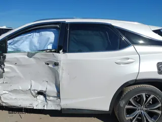 2018 Lexus RX 350 z VIN 2T2ZZMCAXJC106256, wystawiony jako IAAI lot #41658817 z przebiegiem 103 733 mil mil oraz . Historia ofert i sprzedaży dostępna na DreamBid. Obrazek 13.