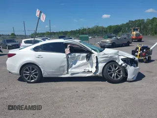 2016 Mazda Mazda6 i Grand Touring with VIN JM1GJ1W55G1443186, listed as a IAAI auction lot 42063716 with 114,263 mi miles. Bid and sale history available at carsss.com. Image 13.