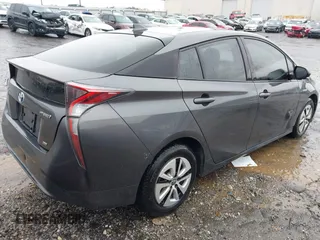 2017 Toyota Prius Two z VIN JTDKARFU9H3046747, wystawiony jako IAAI lot #41773391 z przebiegiem 148 728 mil mil oraz . Historia ofert i sprzedaży dostępna na DreamBid. Obrazek 4.