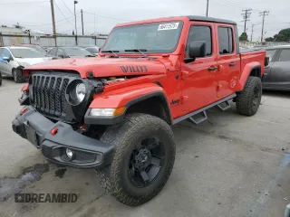 2022 Jeep Gladiator Texas Trail with VIN 1C6HJTAGXNL117353, listed as a Copart auction lot 66411575 with 28,801 mi miles and Salvage title. Bid and sale history available at DreamBid. Image 1.