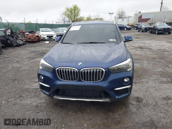 2019 BMW X1 sDrive28i z VIN WBXHU7C5XK5L10933, wystawiony jako IAAI lot #41931162 z przebiegiem 55 308 mil mil oraz . Historia ofert i sprzedaży dostępna na DreamBid. Obrazek 12.