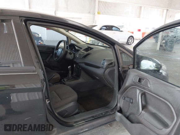 2014 Ford Fiesta S with VIN 3FADP4TJ7EM101992, listed as a IAAI auction lot 42487696 with 205,585 mi miles and . Bid and sale history available at DreamBid. Image 5.