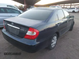 2004 Toyota Camry LE with VIN 4T1BE32K54U260916, listed as a IAAI auction lot 42052542 with 260,721 mi miles and . Bid and sale history available at carsss.com. Image 4.