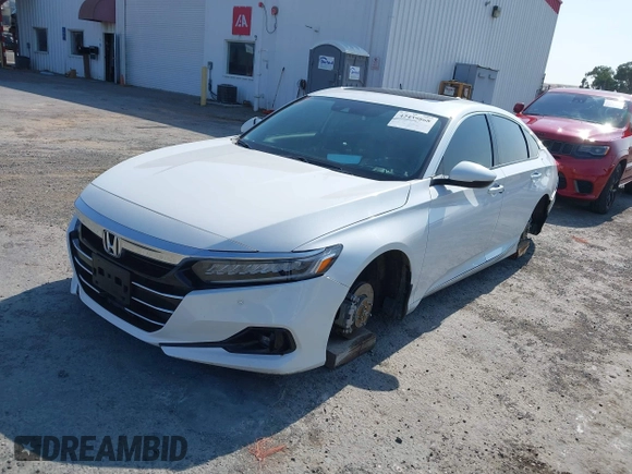 2021 Honda Accord Touring with VIN 1HGCV2F98MA021468, listed as a IAAI auction lot 42439868 with 78,615 mi miles and . Bid and sale history available at DreamBid. Image 2.