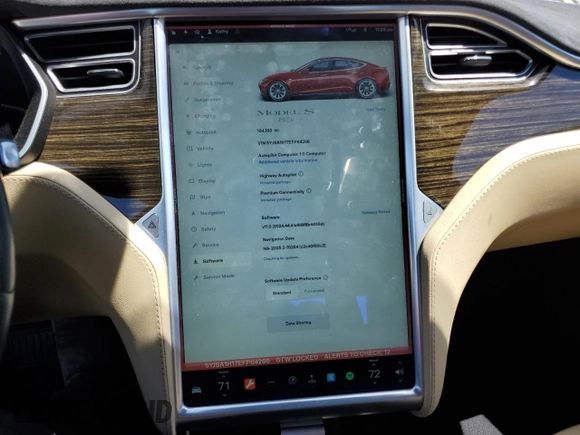 2014 Tesla Model S 60 with VIN 5YJSA1H17EFP64266, listed as a Copart auction lot 61678485 with 104,160 mi miles and Salvage title. Bid and sale history available at DreamBid. Image 9.