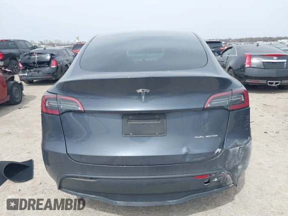 2023 Tesla Model Y Long Range with VIN 7SAYGDEE0PA036048, listed as a IAAI auction lot 41775845 with 41,291 mi miles. Bid and sale history available at carsss.com. Image 15.