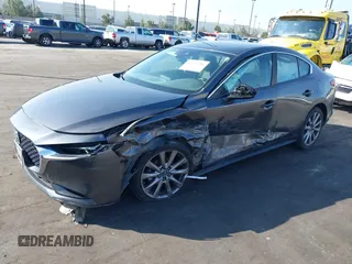2019 Mazda 3 w/Select with VIN 3MZBPAAL1KM105498, listed as a IAAI auction lot 41601386 with 113,203 mi miles. Bid and sale history available at carsss.com. Image 18.