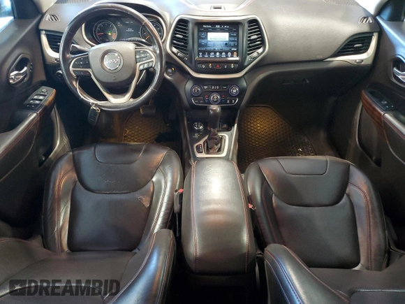 2015 Jeep Cherokee Trailhawk with VIN 1C4PJMBS5FW615845, listed as a Copart auction lot 52824635 with 134,873 mi miles and Salvage Title. Bid and sale history available at carsss.com. Image 8.